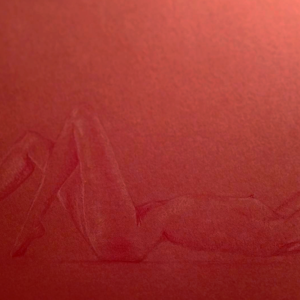 A drawing of a nude woman laying on her back, cropped to show only her body. The drawing is red colored pencil on red paper.